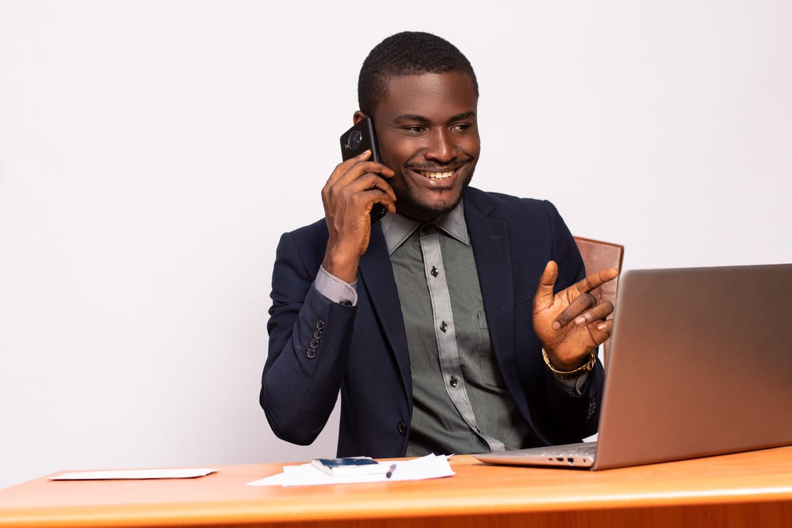 business man making a phone call while working